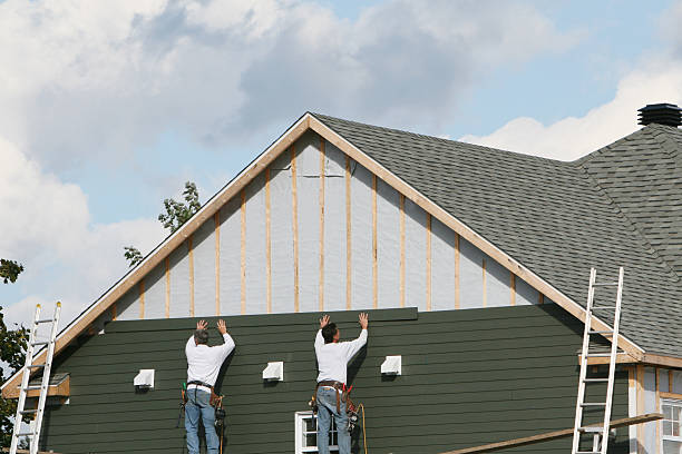 Professional Storm Damage Siding Repair technician working in Cleveland, NC